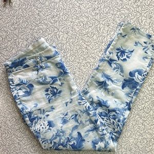 Slim Leg Ankle length jeans by Chico’s. Fun floral print.